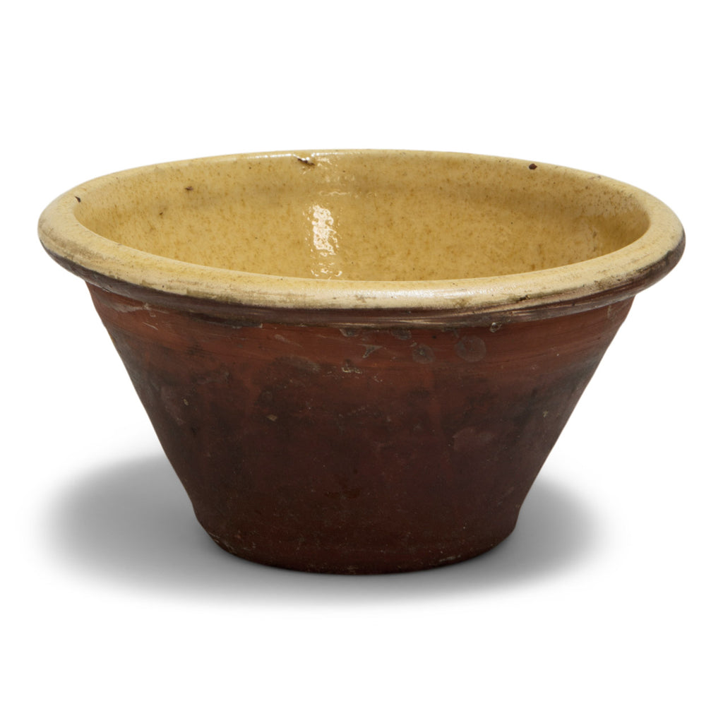 A charming little late nineteenth century bread proving bowl with a honey coloured glazed interior.