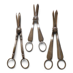 Three pairs of elegant antique silver-plated grape scissors. 