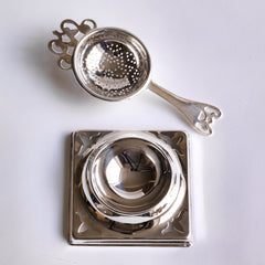 Edwardian tea strainer and stand