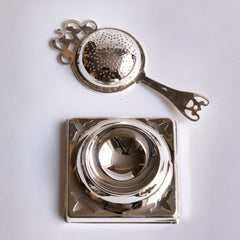 Edwardian tea strainer and stand
