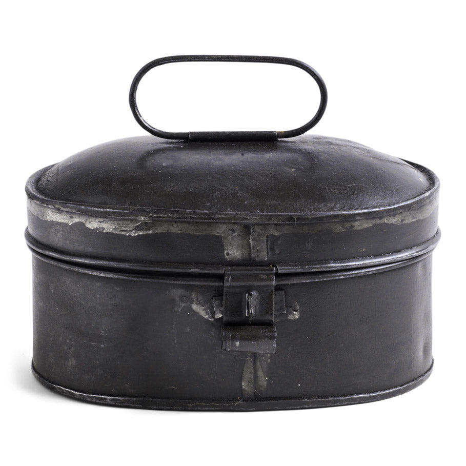 A charming little Victorian spice tin of oval form with hinged lid and carrying handle, and with original painted finish. We think it would make a wonderful tea caddy. Country of origin: UK Date of manufacture: c.1890 Material: tin Dimensions: Length 17cm Depth 12cm Height 10cm Condition: excellent