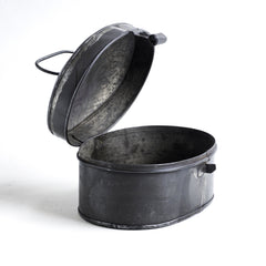 A charming little Victorian spice tin of oval form with hinged lid and carrying handle, and with original painted finish. We think it would make a wonderful tea caddy. Country of origin: UK Date of manufacture: c.1890 Material: tin Dimensions: Length 17cm Depth 12cm Height 10cm Condition: excellent