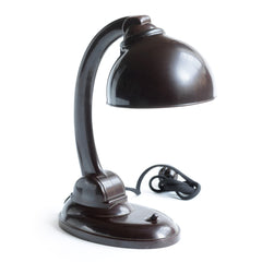 A rare 1930s all-Bakelite lamp designed by British designer Eric Kirkman Cole. It has a pivoting arm and adjustable shade for directional lighting making it ideal for the desk or the bedside table.
