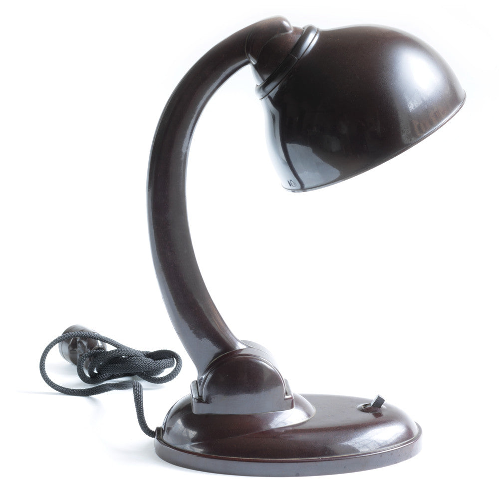 A rare 1930s all-Bakelite lamp designed by British designer Eric Kirkman Cole. It has a pivoting arm and adjustable shade for directional lighting making it ideal for the desk or the bedside table.