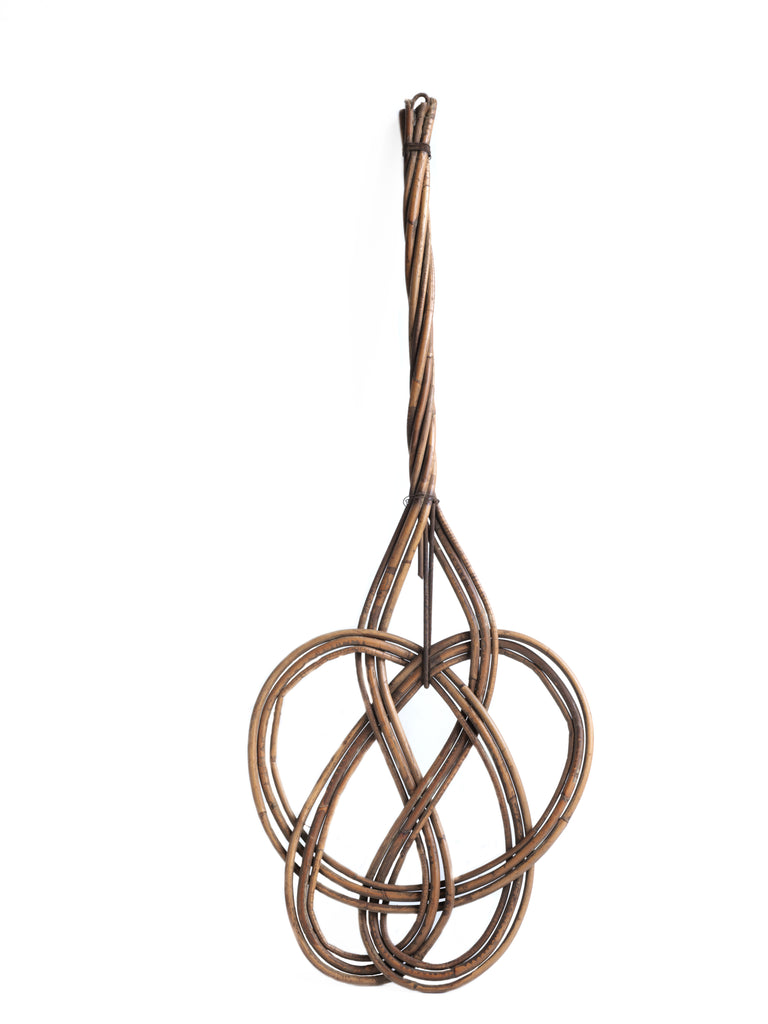 We have a collection of these Victorian carpet beaters, all different in design yet similar. Woven from rattan - the tendrils of a climbing palm - they make a cool piece of wall art when hung up on a plain background or on the back of a door.