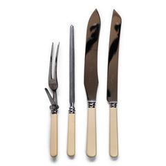 A four piece 'bone-handle' carving set by Margress of Sheffield, consisting of a carving knife and fork, a sharpening steel, and a matching bread knife.  And in such pristine condition, it looks like this set has never been used. Back in the day, it was marketed as "The Hygienic Carver Set", as it boasts a clip-on guard that can be detached from its carving fork to make cleaning after use easier.