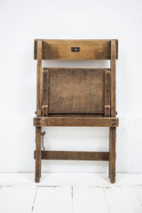 Very good-looking cricket pavilion chairs, each with a small enamel number affixed to its back (numbers 18 and 20). Each is beautifully constructed of solid beech and designed to fold flat when not in use, and so can easily be stored.