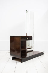 A striking geometric French Art Deco dressing table of good 1930s design; and similar to designs produced by the king of French Deco cabinet makers, Emile Jacques Ruhlmann, for the English cosmetics retailer Yardley.