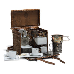 An original Edwardian Drew & Sons En Route tea basket travelling picnic set in white enamel, steel and nickel, with handwoven rattan detailing. Drew & Sons “As supplied to her majesty the queen” (Queen Mary) were the Rolls Royce of picnic set makers, and were originally based in Piccadilly, London – which is where this set was originally retailed. Their picnic sets are rare to find, let alone in such good condition, and are now highly sort after.