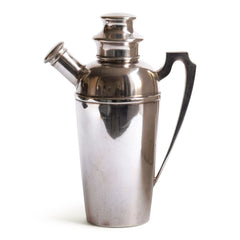 A very fine 1930s silver plated cocktail shaker with capped pouring spout and striking handle. The base is stamped "EPNS B 1553 Made in England 1 1/2 Pint"and it has its original silver plate finish.   The same model with the same base stamp sold through Rago Auctions, New Jersey USA on 3rd December 2020 for $960 (£700)