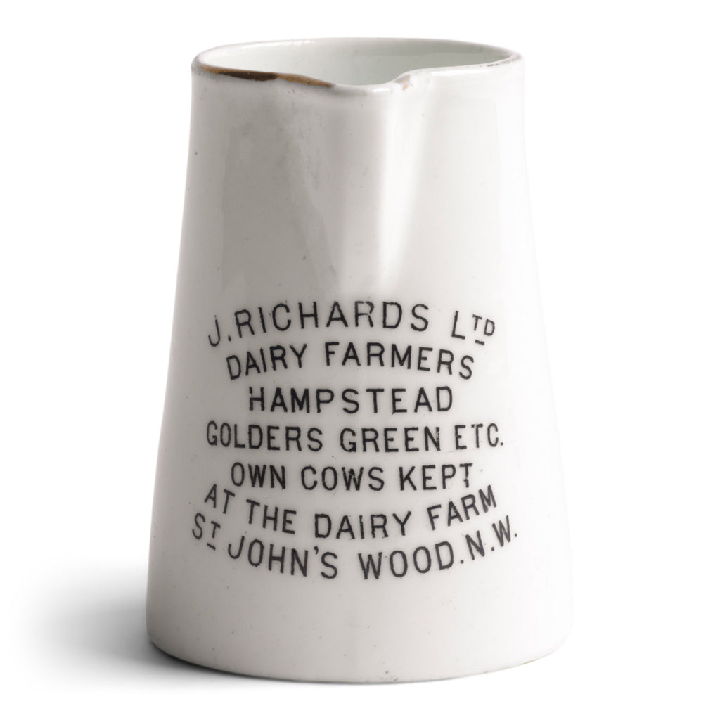 A wonderful and rare little advertising jug for a dairy farm that existed in St John's Wood, London: "J. Richards Ltd Dairy Farmers Hampstead Golders Green Etc Own Cows Kept At The Dairy Farm St John's Wood N.W." c.1900 Material: porcelain. Height 7cm. Diameter 5cm.