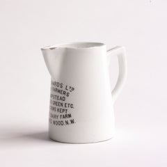 A wonderful and rare little advertising jug for a dairy farm that existed in St John's Wood, London: "J. Richards Ltd Dairy Farmers Hampstead Golders Green Etc Own Cows Kept At The Dairy Farm St John's Wood N.W." c.1900 Material: porcelain. Height 7cm. Diameter 5cm.