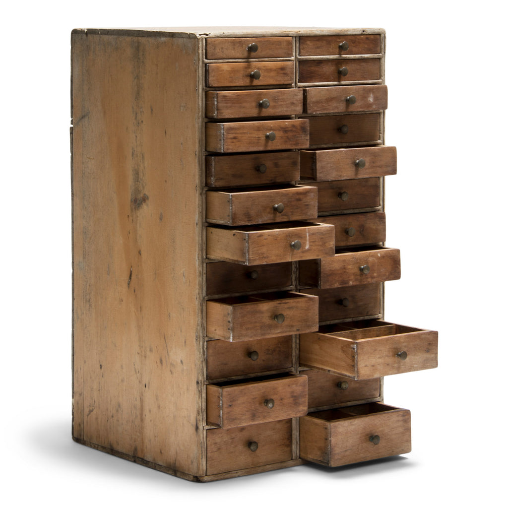 A very tidy little bank of antique engineer's worktop drawers with original patina and in exceptional condition. Each of the 24 drawers has its original metal pull, and all drawers contain eight divisions.