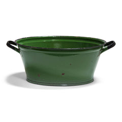 A striking moss-green oval enamel tub with twin black handles and a black rim.