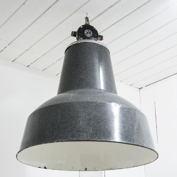 A super-large industrial enamel factory light with a speckled grey enamel exterior and a white enamel reflective interior.