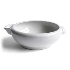 A good large early twentieth century ironstone dairy pouring bowl with roll-top rim and cupped handle by Grimwade, marked to the base 'The "Grimwade" Safety Milk Bowl patent no. 5381/09 registered shape no. 537320'.
