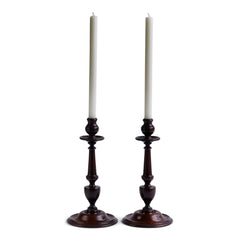 A magnificent large pair of 1920s turned dark stained oak candlesticks, complete with drip trays.