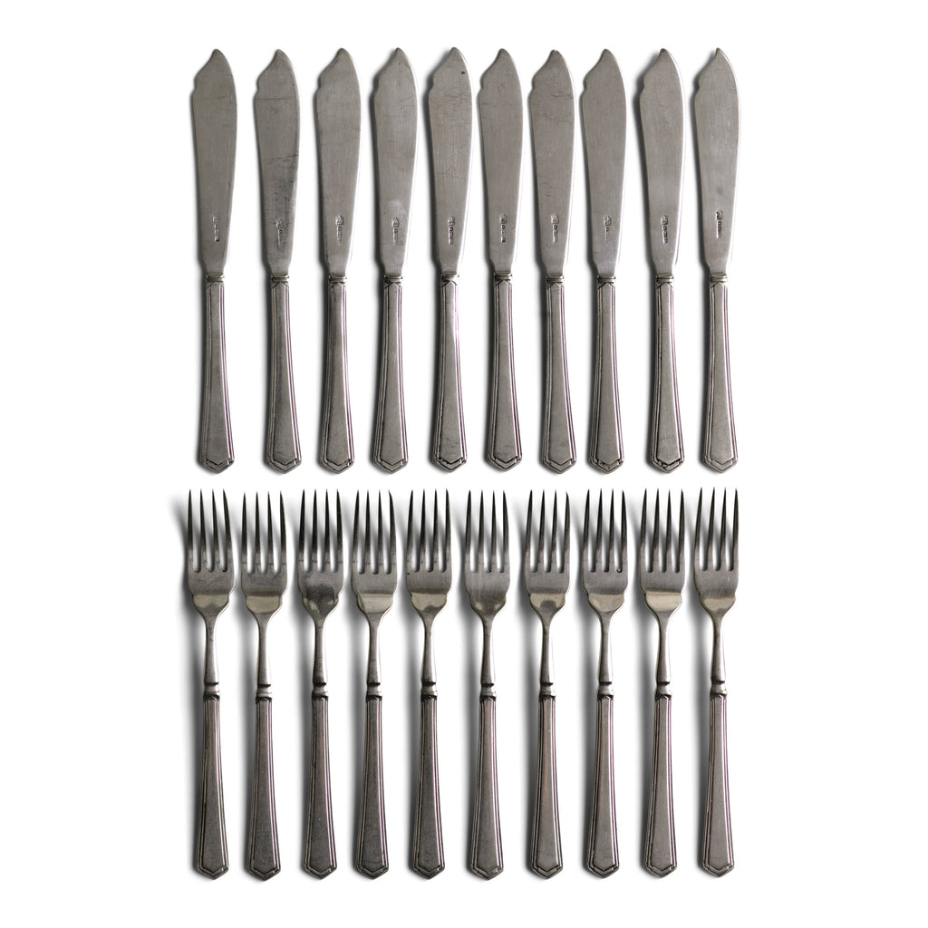 Set of twenty vintage Art Deco silver-plated fish knives and fish forks These well designed fish knives and forks knives have silver plated blades and silver-plated handles, the flared handles end with a classic 1930s Art Deco motif.