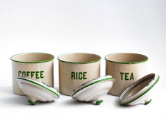 Set of three 1930s enamel storage canisters