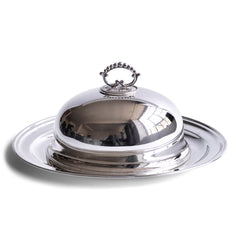 A handsome early twentieth century silver-plated food dome stamped "Spurrier & Co Manufacturer 29 Coleman St London", and a silver-plated oval platter by "H Freedman & Sons". The cover has a decorative handle with acanthus leaf decoration and hanging hook. We have had this item re-silver-plated.
