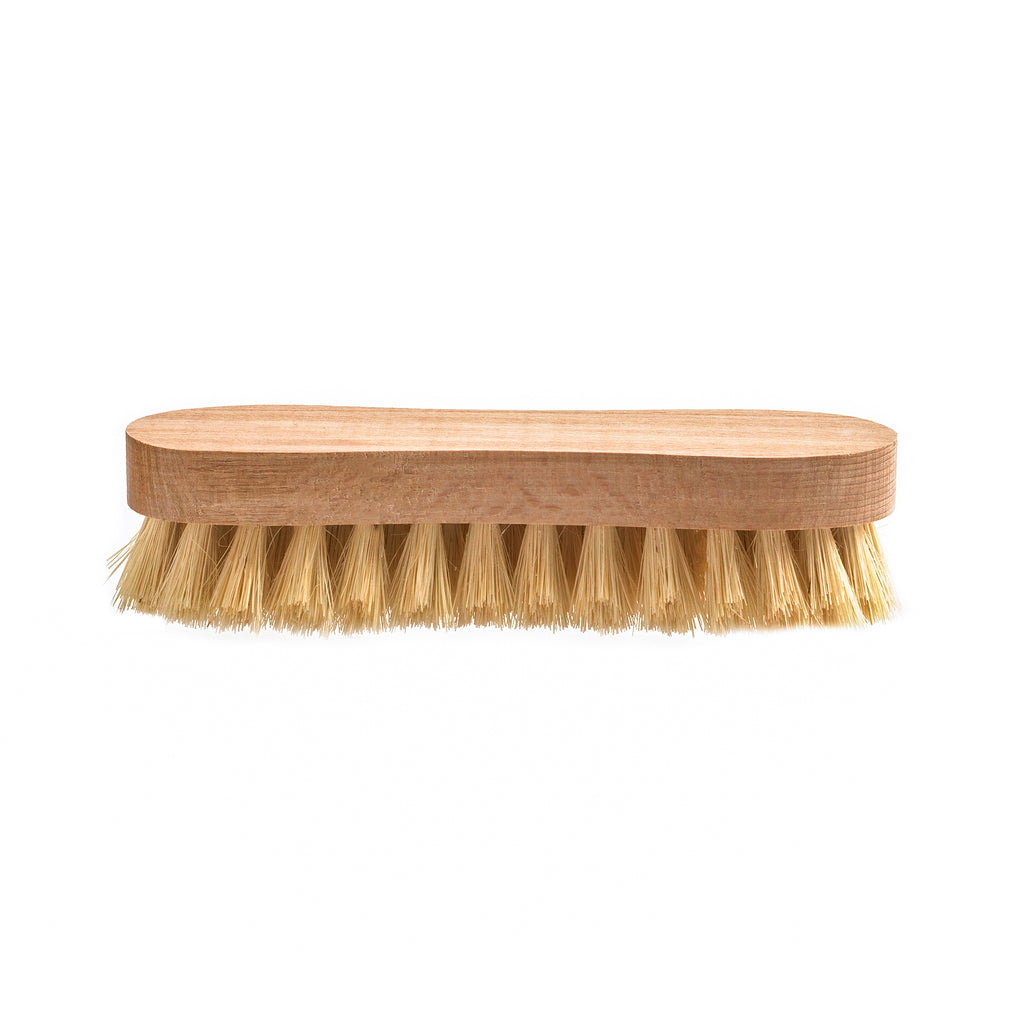 A handy small scrubbing brush with four stout rows of all-natural and tampico bristles affixed to a beech wood handle.