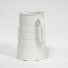 A good early twentieth century ironstone water jug with incised banding. These are getting much harder to find these days, and this one is in excellent condition.  Year of manufacture: 1910 Origin: England Material: Ceramic ironstone Height 18.5cm Diameter 12.5cm Diameter handle to spout 15.5cm Condition: excellent