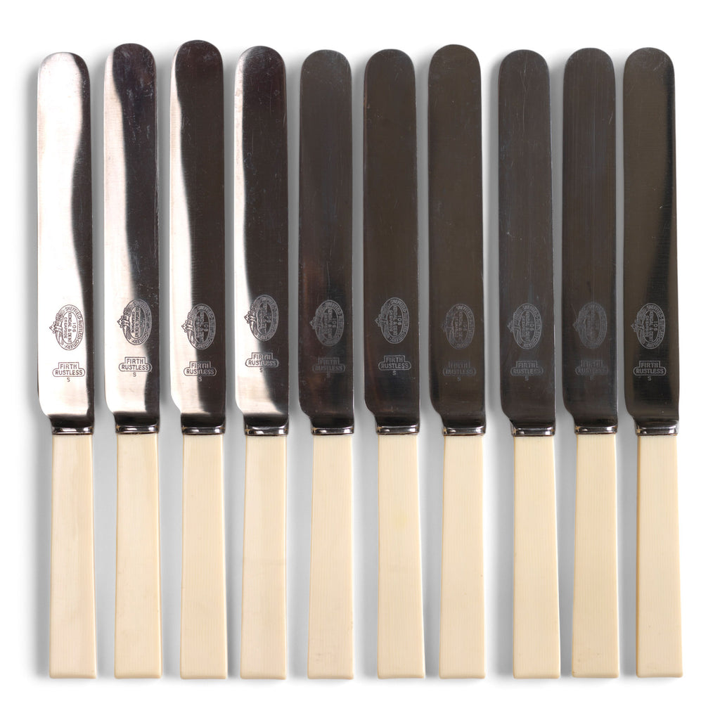 A very handsome set of 10 square-ended dinner knives, each blade marked "106 Kendal & Dent Cheapside / Sheffield Rustless Cutlery / Firth Rustless".