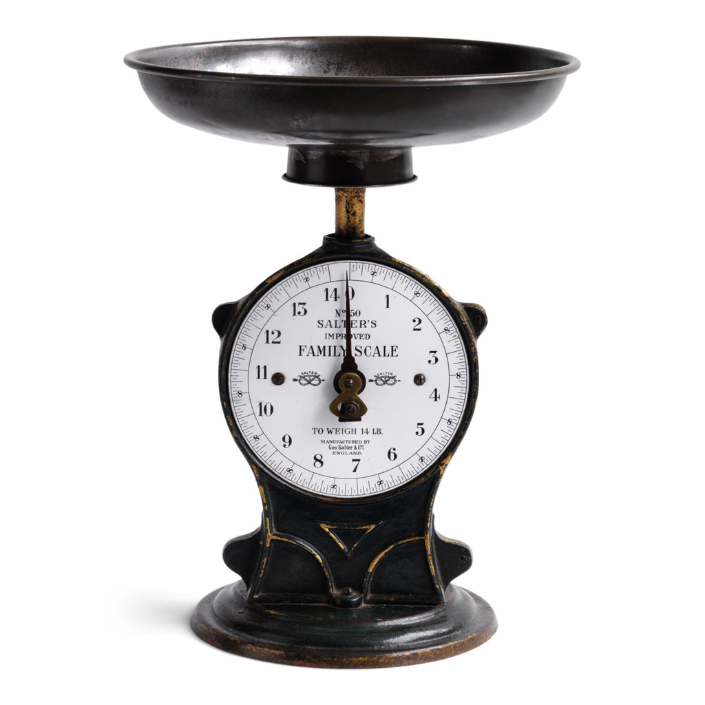 A rare set of Edwardian Salter's family weigh scales in cast iron with a wonderful enamel face, detachable steel weighing bowl and with original black painted finish. The white enamel dial is marked "No 50 Salter's Improved Family Scale / To Weigh 14 lb / Manufactured by Geo Salter & Co England ", and the dial divisions are in imperial lbs and ounces. It is rare to find the enamel face in such good condition.