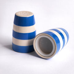A Cornish Ware salt and pepper cruet set by T G Green - showing underside with plastic stopper.