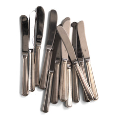 Vintage hotel ware silver-plated WMF butter knife, made for Holland & America Line, the cruise liner company. Each is marked WMF and the tip of the fork handles bear the hallmark Holland & America circular crest, the Art Deco stylised prow of a large transatlantic steamship.