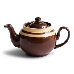 A charming little vintage Brown Betty teapot with two cream coloured bands.