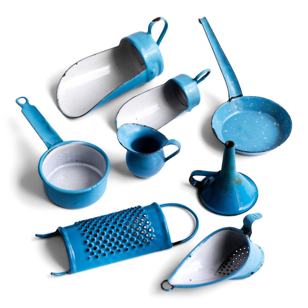 An extensive collection of pale blue enamel miniature antique kitchen ware, previously owned by the miniaturist specialist and collector extraordinaire Joan Dunk; including, flour scoops, sieve, ewer, grater, saucepan, frying pan and a funnel.