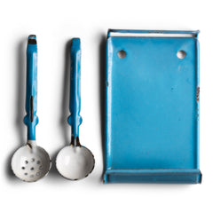 A rare and very charming miniature blue enamel utensil rack with two utensils: a scoop and a ladle. This is part of an extensive collection of miniature pale blue enamel kitchen ware, previously owned by the miniaturist specialist and collector extraordinaire Joan Dunk. 