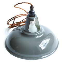 Our traditional enamelled workshop pendant light is all fitted, wired and ready to go.  It makes a very handsome addition to any room and is particularly practical when suspended low over a desk, table or kitchen work surface, as it is fitted with a handy on/off switch.