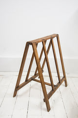 A very elegant Edwardian folding blanket horse, perfect for bathroom towels or for the bedroom, for slinging clothes over at bedtime.  Beautifully constructed from polished pine with hinge detailing - and designed to fold flat when not in use, and so can easily be stored.