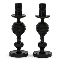 A striking pair of 1930s ebony candlesticks, each with turned concave fluting. Most likely made in Africa for the European market.