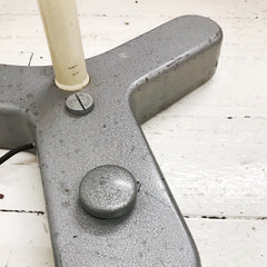 The tri-footed base with foot operated switch of our striking 1950s adjustable dental lamp by Carl Zeiss Jena