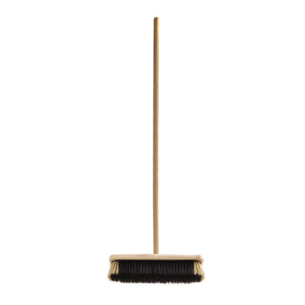 Our everyday broom is handmade, and by one the last surviving brush makers in the UK. It has a traditional arrangement of white and dark hog's hair set in a wooden head, and is excellent for sweeping tiled and stone floors, floorboards and around fireplaces