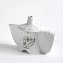 An antique Grimwades ironstone "Bleriot" combined pie funnel and pie divider.