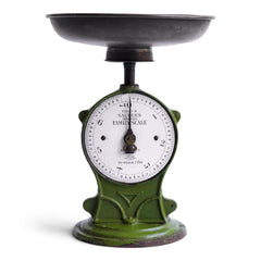 A stunning set of Edwardian Salter's family weigh scales in cast iron with a wonderful enamel face, detachable polished steel weighing bowl and with original utility green painted finish. The white enamel dial is marked "Class II Salter's Improved Family Scale / To Weigh 7 lb ", and the dial divisions are in imperial lbs and ounces.