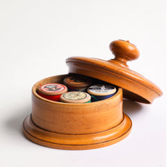 A very pleasing Victorian cotton reel holder made from a single piece of turned and polished boxwood. The container is fitted with its original four cotton reel spindles. 