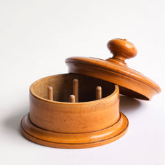 A very pleasing Victorian cotton reel holder made from a single piece of turned and polished boxwood. The container is fitted with its original four cotton reel spindles. 