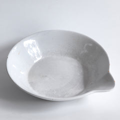 A large Victorian ironstone dairy pouring bowl with a particularly striking pouring lip.