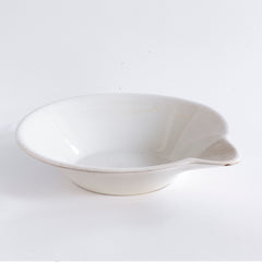 A super-large Victorian ironstone dairy pouring bowl by the "Dairy Supply Company London" (stamp applied to underside) with a rolled rim and a particularly striking pouring lip.