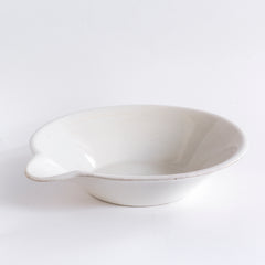 xA super-large Victorian ironstone dairy pouring bowl by the "Dairy Supply Company London" (stamp applied to underside) with a rolled rim and a particularly striking pouring lip.