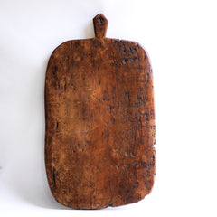 Antique bread board with beautiful patina and time worn surface.