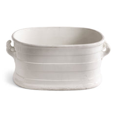 A Victorian oval-shaped foot bath with roll-top rim, raised banding, and up-scrolled handles. It has a good plinth shaped base, has a lovely weight and is in great condition.