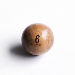 A collection of beautifully made antique numbered balls and skittles, each hand crafted from polished boxwood, and each a beautiful example of late 19th century treen.