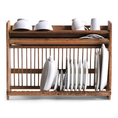 A good Edwardian scrubbed pine plate draining rack which can either be surface stood or wall mounted. Beautifully constructed, it is fitted with a full set of plate dividing spindles. Cups, mugs and bowls can be put to drain upside down on its top shelf, and it accommodates modern-day large dinner plates comfortably. It holds up to 24 large plates, and has a handy narrow upper shelf for saucers and pan lids.