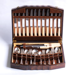 A good-looking silver plated 45 piece canteen of cutlery by Buss King, Sheffield, c.1930, and in its original Art Deco style oak veneered and brown felt-lined box. The set is for 6 people.